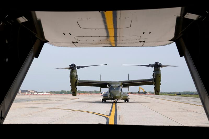 FILE - A U.S. Marine Corps Osprey aircraft taxies behind an Osprey carrying members of the White House press corps at Andrews Air Force Base, Md., April 24, 2021. Families of four of the five Marines killed when their MV-22 Osprey tiltrotor aircraft crashed in California in June of 2022 filed a federal lawsuit Thursday, May 23, 2024, alleging that the Osprey's manufacturers failed to address known mechanical failures with the airframe. (AP Photo/Patrick Semansky, File)