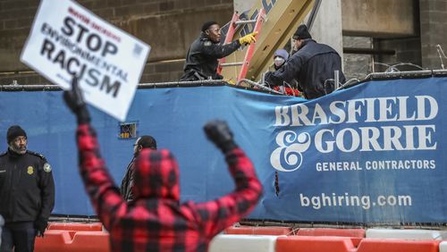 Brasfield & Gorrie, a contractor hired to build Atlanta’s public safety training center, is being sued alongside officers of the Georgia State University Police Department after a freelance photographer was arrested while capturing images associated with a protest against the project in July 2022. (John Spink / John.Spink@ajc.com)