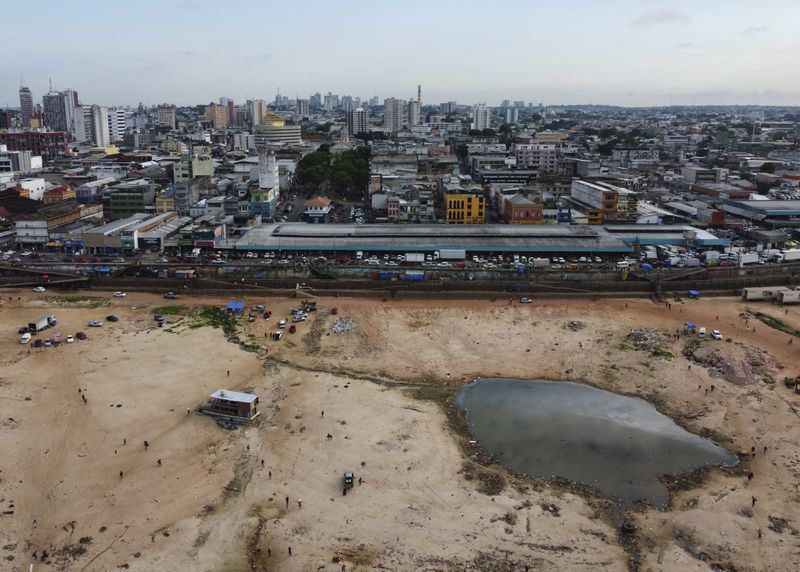 The Negro River is dry at the port in Manaus, Amazonas state, Brazil, Friday, Oct. 4, 2024, amid severe drought. (AP Photo/Edmar Barros)