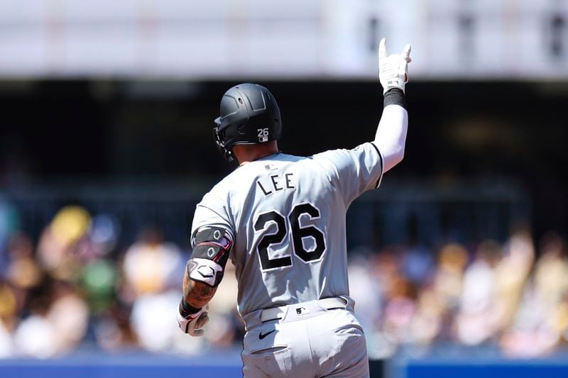 Chicago White Sox's Korey Lee celebrates while running the bases after hitting a solo home run against the San Diego Padres in the fourth inning of a baseball game Sunday, Sept. 22, 2024, in San Diego. (AP Photo/Derrick Tuskan)