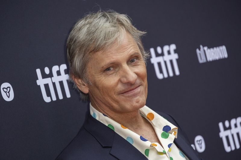 FILE - Viggo Mortensen attends the premiere of "The Dead Don't Hurt" during the Toronto International Film Festival, Sept. 8, 2023, in Toronto. An international film festival in the western Czech spa of Karlovy Vary has kicked off with an honor for U.S. actor and director Viggo Mortensen. Mortensen, who was nominated three times for the Academy Award as the best actor, will receive the Festival President's Award at Friday's June 28, 2024 opening ceremony and present the second movie he directed "The Dead Don't Hurt." (Photo by Joel C Ryan/Invision/AP, File)