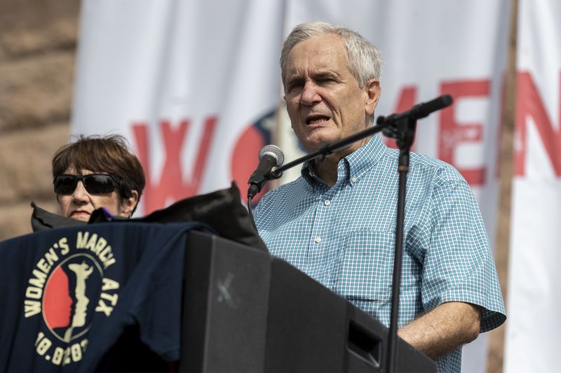 FILE - U.S. Rep. Lloyd Doggett, D-Texas, speaks during the Women's March ATX rally, Oct., 2, 2021, in Austin, Texas. It's been two weeks since President Joe Biden's debate with Donald Trump. On Thursday, July 11, the 11th lawmaker joined the list of Democrats calling on Biden to end his candidacy. After days of reckoning, many more are known to be harboring that wish. Doggett became the first lawmaker to say Biden should go. (AP Photo/Stephen Spillman, File)