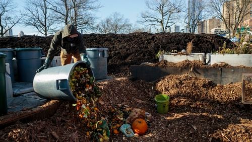 **EMBARGO: No electronic distribution, Web posting or street sales before WEDNESDAY 11:50 P.M. ET JAN. 25, 2023. No exceptions for any reasons. EMBARGO set by source.** FILE — A worker sorts through food scraps at the East River Compost Yard in Manhattan, on Dec. 15, 2020. A decade after Michael R. Bloomberg co-opted a line from “Star Trek” to declare composting the “final recycling frontier,” New York City is finally poised to unveil plans to implement what it is calling the nation’s largest composting program. (Sarah Blesener/The New York Times)