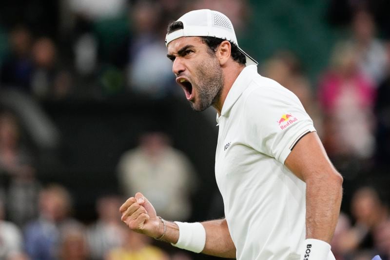 Matteo Berrettini of Italy reacts during his second round match against compatriot Jannik Sinner on day three at the Wimbledon tennis championships in London, Wednesday, July 3, 2024. (AP Photo/Alberto Pezzali)