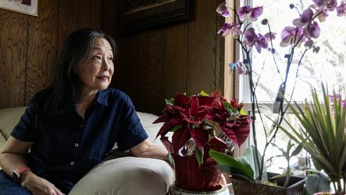 Alice Yi, co-founder of Asian Texans for Justice, looks out the window of her home in Austin, Texas, on June 21, 2024. Yi has advocated for the Asian American community for decades and is now fighting racialized disinformation. (Photo by Eliana Alzate/News21)