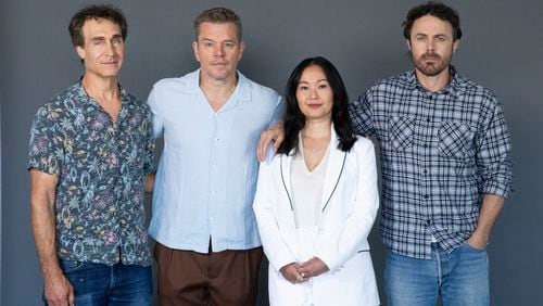 Director Doug Liman, left, poses with actors, Matt Damon, from second left, Hong Chau, and Casey Affleck to promote the film "The Instigators" on Friday, July 26, 2024, in Boston. (AP Photo/Reba Saldanha)