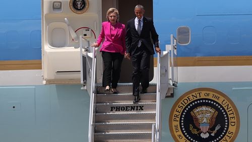 CHARLOTTE, NC - JULY 05: Democratic presidential candidate former Secretary of State Hillary Clinton walks off of Air Force One with U.S. president Barack Obama on July 5, 2016 in Charlotte, North Carolina. Hillary Clinton is campaigning with president Obama in North Carolina. (Photo by Justin Sullivan/Getty Images)