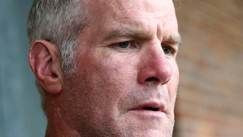 FILE - Retired NFL quarterback Brett Favre speaks to the media in Jackson, Miss., Oct. 17, 2018. (AP Photo/Rogelio V. Solis, File)