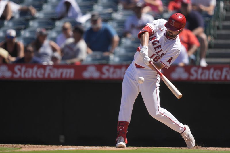 Los Angeles Angels' Nolan Schanuel hits a single during the sixth inning of a baseball game against the Atlanta Braves, Sunday, Aug. 18, 2024, in Anaheim, Calif. (AP Photo/Ryan Sun)