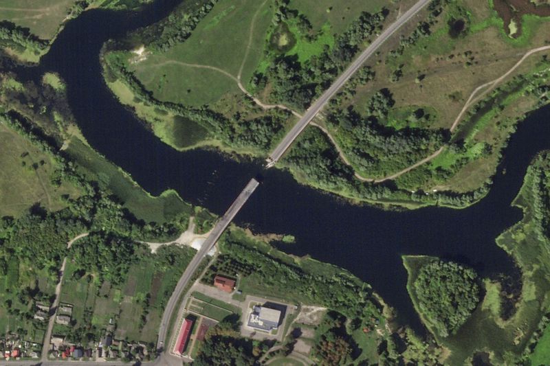 This satellite photo from Planet Labs PBC shows a destroyed bridge across the Seim River at the town of Glushkovo in Russia's Kursk region on Aug. 17, 2024. (Planet Labs PBC via AP)