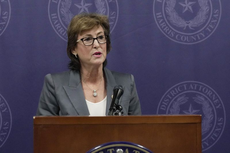 Harris County District Attorney Kim Ogg announces corruption charges related to 2022 Election during a press conference on Tuesday, Aug. 13, 2024, in Houston. Prosecutors say an investigation found no evidence of intent to influence 2022 election outcomes, but Ogg said that her office will pursue criminal charges against a county employee who was allegedly working a second job while polls ran out of paper ballots. (Raquel Natalicchio/Houston Chronicle via AP)