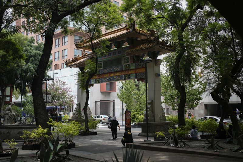 An arch donated by the Chinese government adorns the Degollado Plaza in Mexico City, Wednesday, July 24, 2024. (AP Photo/Eduardo Verdugo)