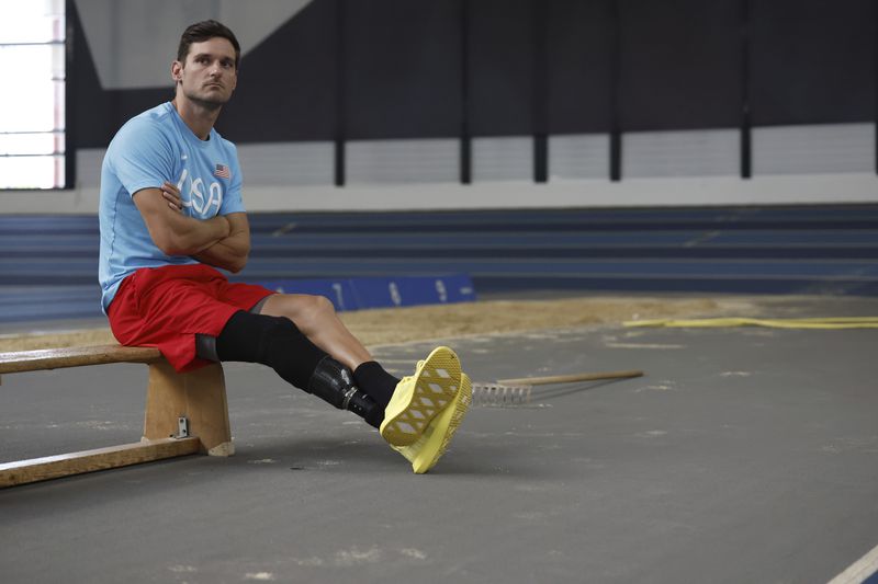 Jarryd Wallace, four time Paralympian in athletics, poses for a photo in the United States Olympic and Paralympic Committee's High Performance Center during the Paralympic Games in Paris on Sunday, Sept. 1, 2024. (AP Photo/Nathalee Simoneau)