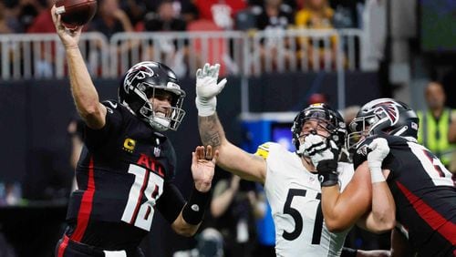 Atlanta Falcons quarterback Kirk Cousins (18) throws a pass during the second half of an NFL football game against the Pittsburgh Steelers on Sunday, Sept. 8, at Mercedes-Benz Stadium in Atlanta. 
(Miguel Martinez/ AJC)