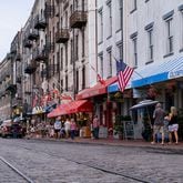 River Street in historic downtown Savannah attracts plenty of tourists. (Rosana Lucia for The Atlanta Journal-Constitution)