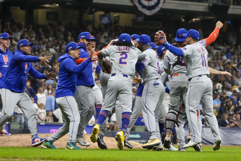 The New York Mets celebrate after winning Game 3 of a National League wild card baseball game against the Milwaukee Brewers Thursday, Oct. 3, 2024, in Milwaukee. The Mets won 4-2. (AP Photo/Morry Gash)