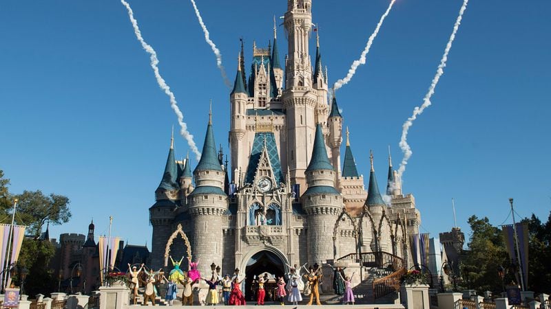 The morning welcome show in front of Cinderella's Castle in Walt Disney World is performed. Recently Disney changed the price structure for tickets.