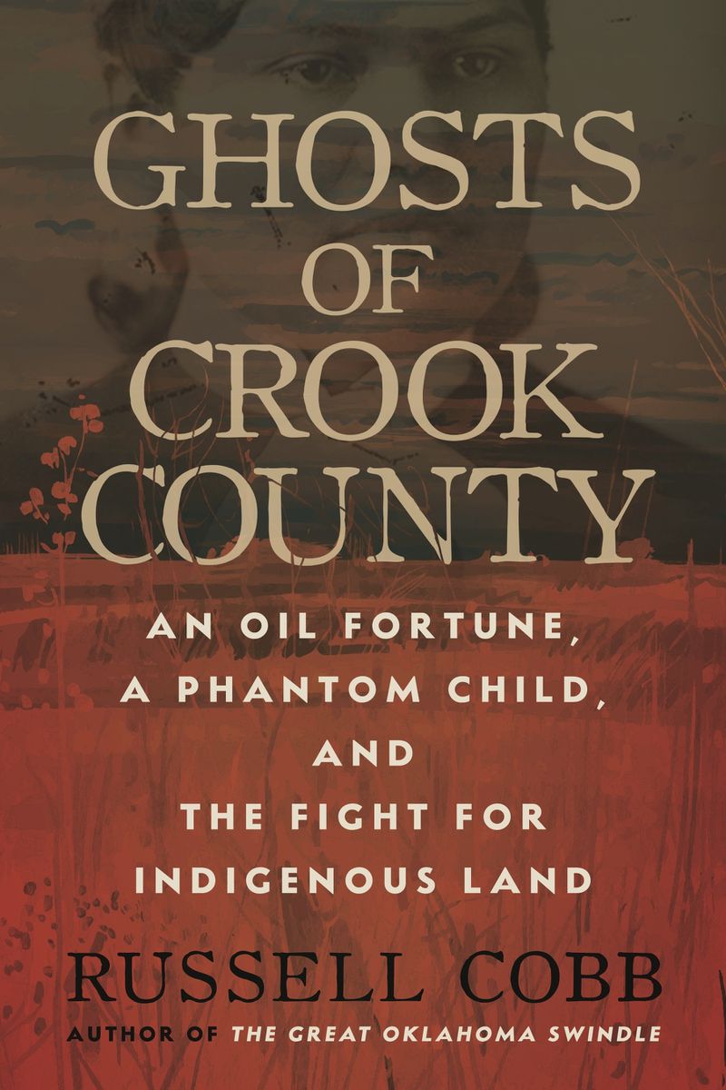 This book cover image released by Beacon Press shows "Ghosts of Crook County: An Oil Fortune, a Phantom Child, and the Fight for Indigenous Land" by Russell Cobb. (Beacon Press via AP)