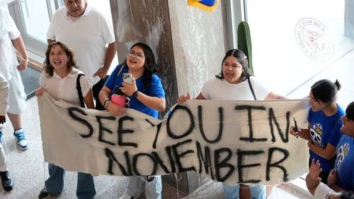 FILE - Opponents to an immigration proposal gather inside the Arizona State Capitol, Tuesday, June 4, 2024, in Phoenix. (AP Photo/Matt York, File)