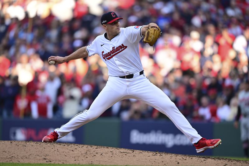 Cleveland Guardians' Cade Smith pitches in the fifth inning during Game 2 of baseball's AL Division Series against the Detroit Tigers, Monday, Oct. 7, 2024, in Cleveland. (AP Photo/David Dermer)