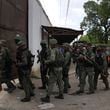 FILE - Soldiers raid the Tocorón Penitentiary Center, in Tocorón, Venezuela, Sept. 20, 2023. The Tren de Aragua gang originated at the prison. (AP Photo/Ariana Cubillos, File)