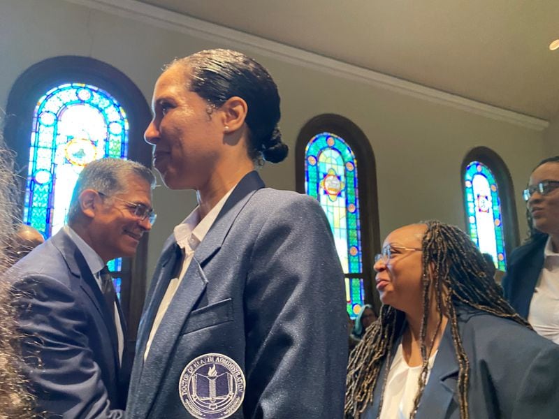 U.S. Secretary of Health and Human Services Xavier Becerra greets Morehouse School of Medicine students on Friday, September 20, 2024, following a taping of a podcast with MSM President Valerie Montgomery Rice at Danforth Chapel. (Photo by Ariel Hart)