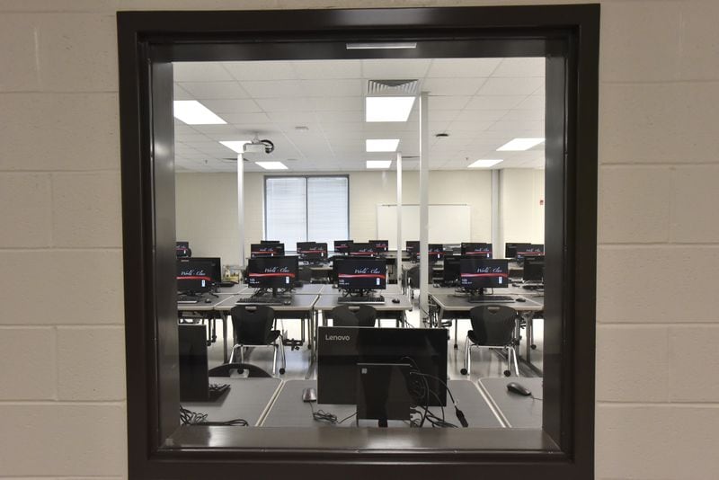  Computer lab can be seen through the window at Paul Duke STEM High School on Thursday, July 19, 2018. 
