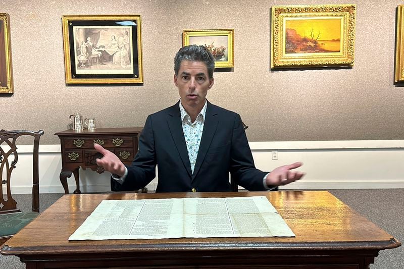 Auctioneer Andrew Bruck talks about a 1787 copy of the U.S. Constitution that will be put up for auction on Sept. 28, 2024 at Bruck Auctions in Asheville, N.C., on Thursday, Sept. 5. (AP Photo/Jeffrey Collins)