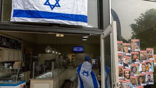 A Passover gathering on April 25 at Ali's Cookies in Atlanta. (Arvin Temkar/The Atlanta Journal-Constitution)