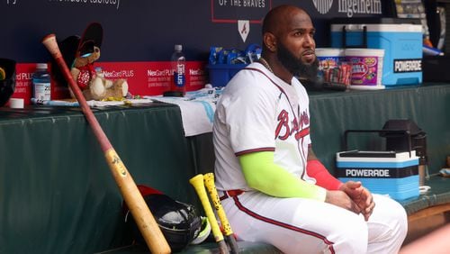 Atlanta Braves designated hitter Marcell Ozuna sits next to the “Snitbear,” in the dugout during the second inning against the Detroit Tigers at Truist Park, Wednesday, June 19, 2024, in Atlanta. The Braves won 7-0. (Jason Getz / AJC)