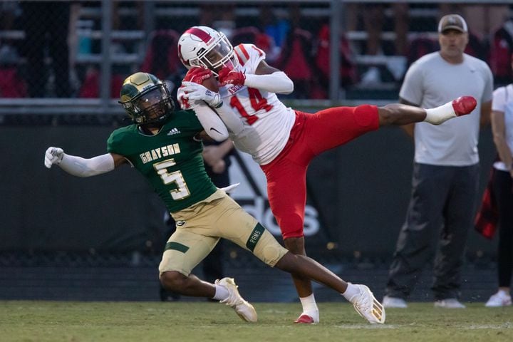 Archer High School's Frank Osorio (14) catches a pass during a GHSA high school football game between Grayson High School and Archer High School at Grayson High School in Loganville, GA., on Friday, Sept. 10, 2021. (Photo/Jenn Finch)