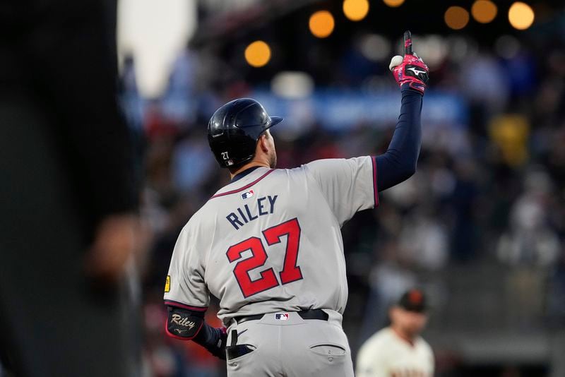 Austin Riley celebrates a home run during a recent game against the San Francisco Giants.