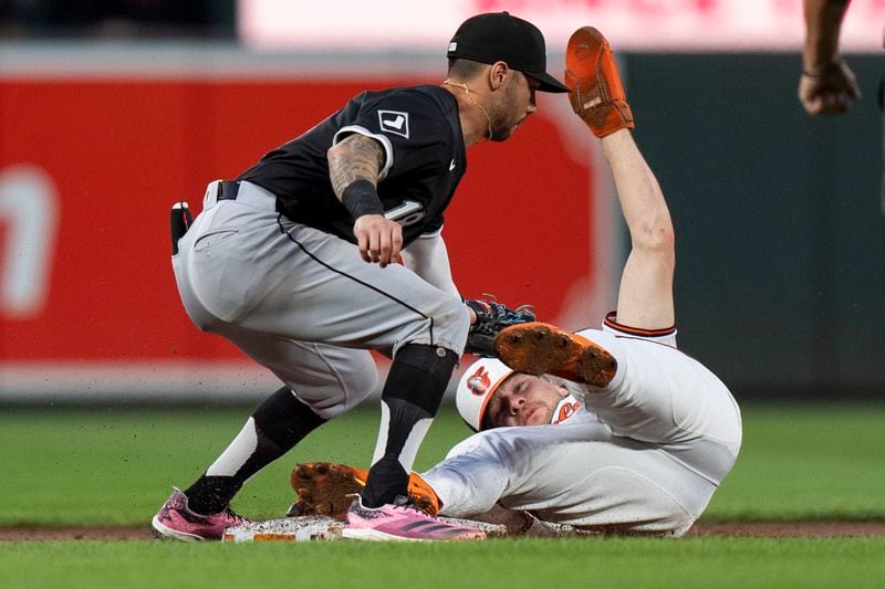 Baltimore Orioles' Gunnar Henderson, right, is caught stealing second as Chicago White Sox shortstop Jacob Amaya (18) applies the tag during the third inning of a baseball game, Wednesday, Sept. 4, 2024, in Baltimore. (AP Photo/Stephanie Scarbrough)