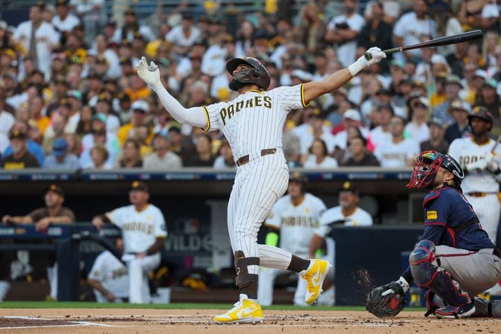 San Diego Padres’ Fernando Tatis Jr. hits a 2-RBI home run against the Atlanta Braves during the first inning of National League Division Series Wild Card Game One at Petco Park in San Diego on Tuesday, Oct. 1, 2024. The Braves fell 4-0.  (Jason Getz / Jason.Getz@ajc.com)