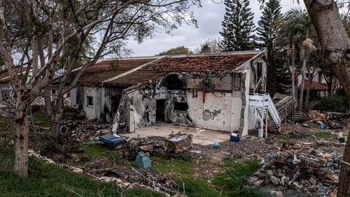 FILE - A battle-scarred home in Kibbutz Be'eri, an Israeli communal farm on the Gaza border, is seen on Thursday, Jan. 11, 2024. Hamas held more than a dozen hostages in the home when it overran southern Israel on Oct. 7. The Israeli military said Thursday that Israeli hostages held in a home that was struck by tank fire last Oct. 7 were killed by Hamas militants, not Israeli shelling, as it released the results of its first investigation into failures during the deadly attack that triggered the nine-month war in Gaza. (AP Photo/Tsafrir Abayov, File)