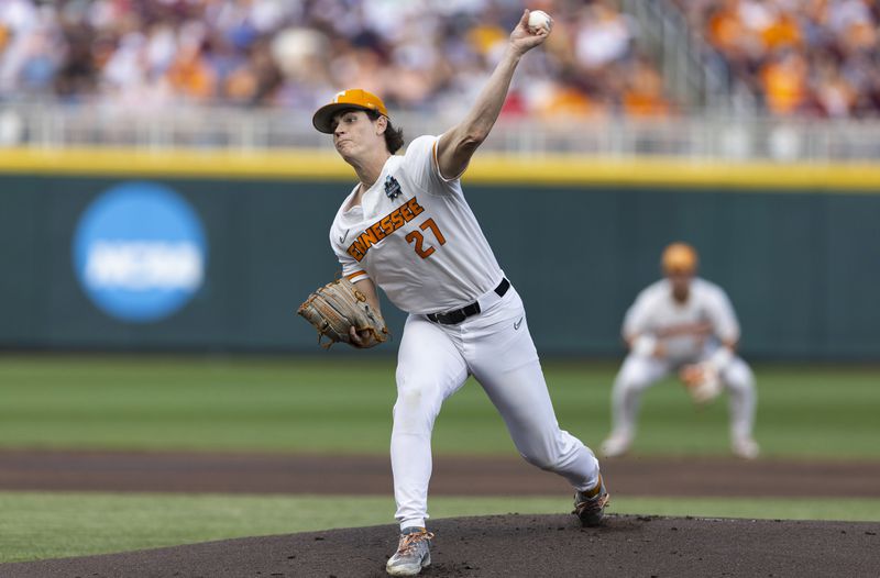 Tennessee starting pitcher Chris Stamos throws to a Texas A&M batter during the first inning of Game 1 of the NCAA College World Series baseball finals in Omaha, Neb., Saturday, June 22, 2024. (AP Photo/Rebecca S. Gratz)