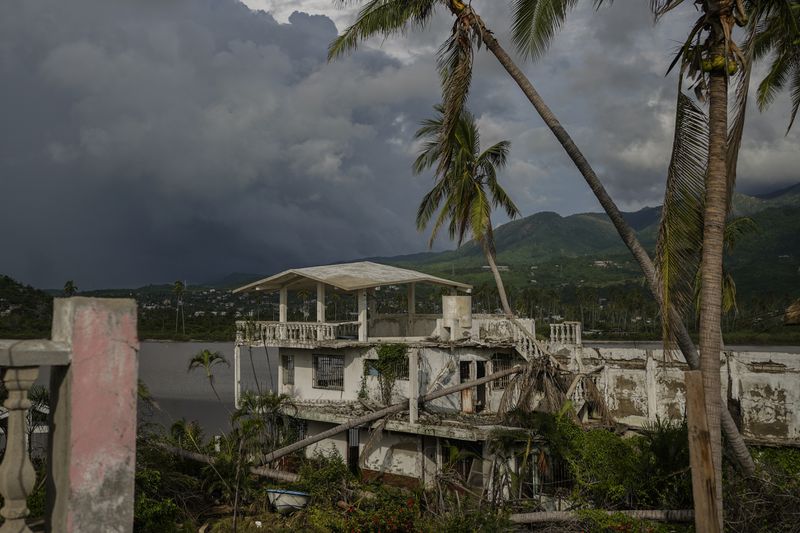 A house lies damaged after the impact of Hurricane John, in Pie de la Cuesta, Guerrero state, Mexico, Monday, Sept. 30, 2024. (AP Photo/Felix Marquez)