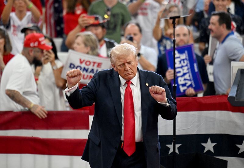 Former President Donald Trump dances as he leaves the stage during a rally in Atlanta last Saturday.