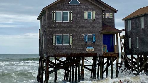 This photo provided by Cape Hatteras National Seashore shows a house several hours before it collapsed into the ocean in Rodanthe, N.C., on Wednesday, Sept. 25, 2024. (Cape Hatteras National Seashore/National Park Service via AP)