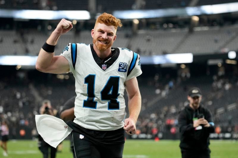 Carolina Panthers quarterback Andy Dalton celebrates after their win against the Las Vegas Raiders in an NFL football game, Sunday, Sept. 22, 2024, in Las Vegas. (AP Photo/John Locher)