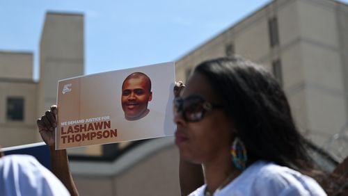 Supporters for Lashawn Thompson’s family rally outside the Fulton County Jail in April. Thompson, 35, was discovered unresponsive in the jail’s psychiatric wing covered in bed bugs in September, according to a Fulton County Medical Examiner report. His body showed no obvious signs of trauma and the cause of death was undetermined, the report said, noting a “severe bed bug infestation” in the jail. (Hyosub Shin / Hyosub.Shin@ajc.com)