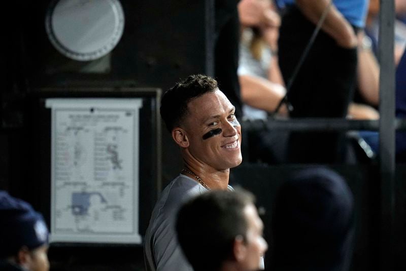 New York Yankees designated hitter Aaron Judge runs the bases after hitting his 300th career home run, the fastest player to do so in MLB history, during the eighth inning of a baseball game against the Chicago White Sox, Wednesday, Aug. 14, 2024, in Chicago. (AP Photo/Erin Hooley)