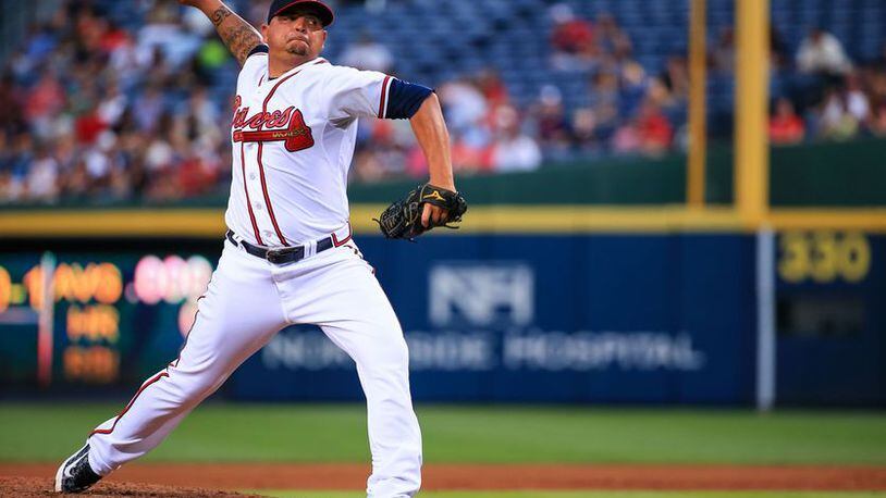 Majors-leading Braves beat the Rays 2-1 in a matchup of teams with