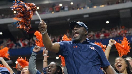 December 2, 2017 Atlanta: Auburn Tigers fans cheer during the first half of the SEC Football Championship at Mercedes-Benz Stadium, December 2, 2017, in Atlanta.  Hyosub Shin / hshin@ajc.com