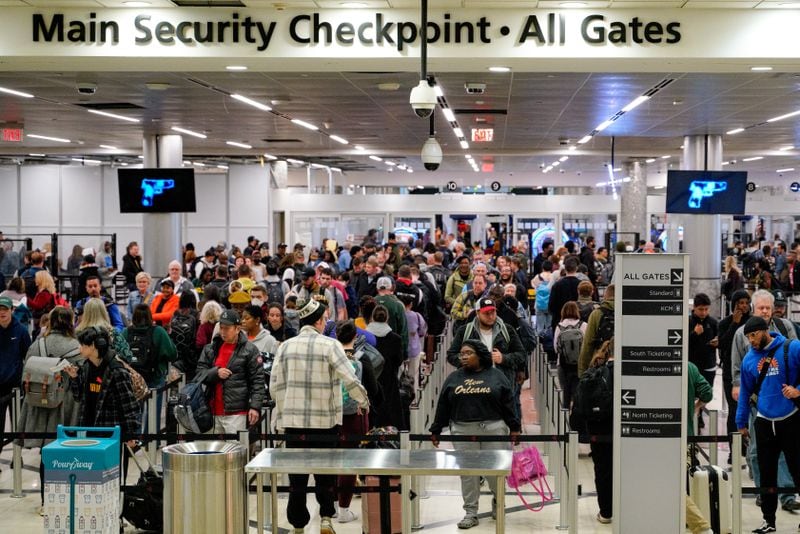 Travelers line up in the main security check point at Hartsfield Jackson International Airport during a busy travel day. Monday, November 27th, 2023 (Ben Hendren for the Atlanta Journal-Constitution)