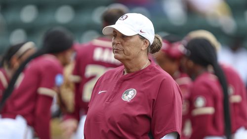 Florida State head coach Lonni Alameda walks to the dugout during an NCAA college softball game against Central Florida, Saturday, May 18, 2024, in Tallahassee, Fla. Florida State defeated Central Florida 5-1. (AP Photo/Gary McCullough)