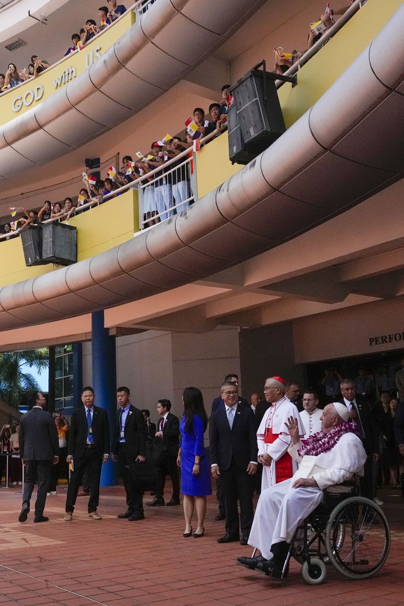 From right, Pope Francis, Archbishop of Singapore William Seng Chye Goh, and Ministry of Culture Edwin Tong attend an interreligious meeting with young people at the Catholic Junior College in Singapore, Friday, Sept. 13, 2024. Pope Francis is wrapping up his visit to Singapore by praising its tradition of interfaith harmony. (AP Photo/Gregorio Borgia)