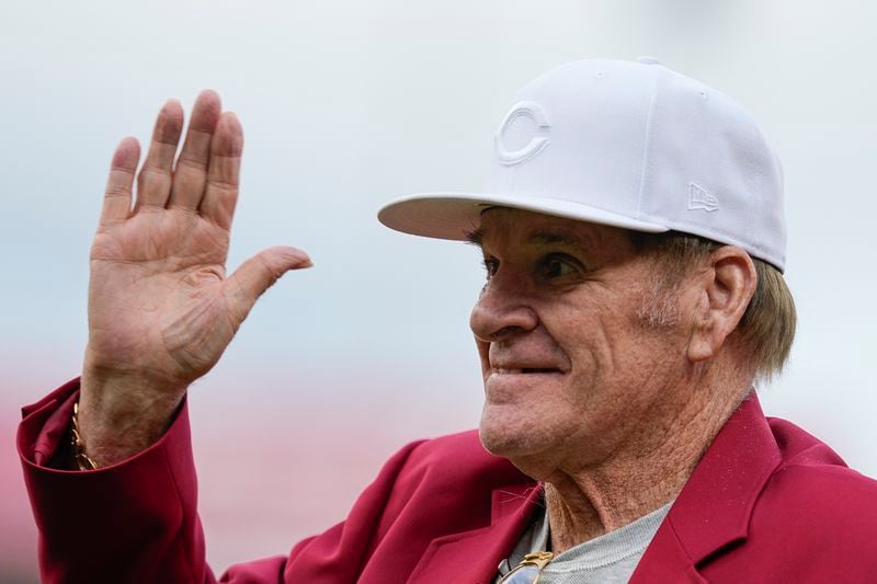 FILE - Former Cincinnati Reds player Pete Rose waves to fans after being introduced during the Reds Hall of Fame Induction Ceremony, July 15, 2023, in Cincinnati. (AP Photo/Darron Cummings, File)