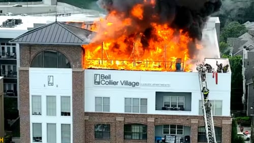 The fourth floor and roof partially collapsed after a massive fire tore through an apartment complex in northwest Atlanta on Saturday night, leaving dozens displaced, officials said. July 28, 2024.