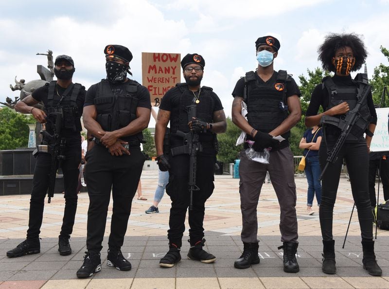 Well-armed members of the Black Panthers attended the Decatur protest. No one seemed alarmed by their presence, including the police, who stood around chatting during the event.